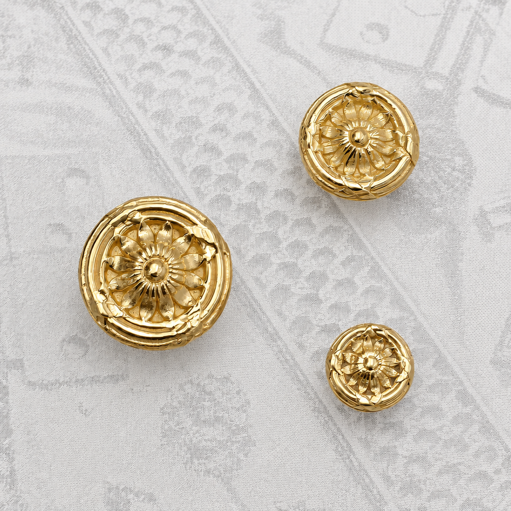 Brass decorative cabinet knobs with embossed floral or rosette detailing