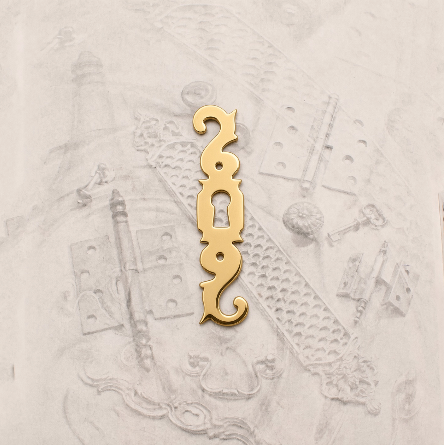 08.1277.28 BRASS ESCUTCHEON