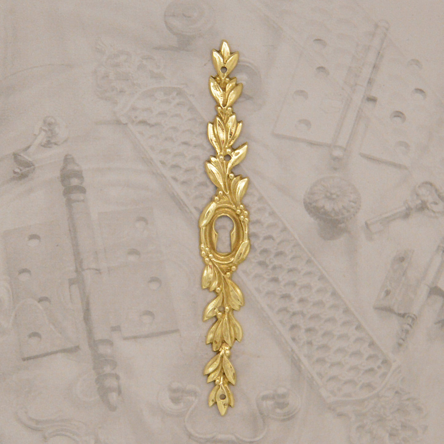 08.268 LOUIS XVI BRASS ESCUTCHEON