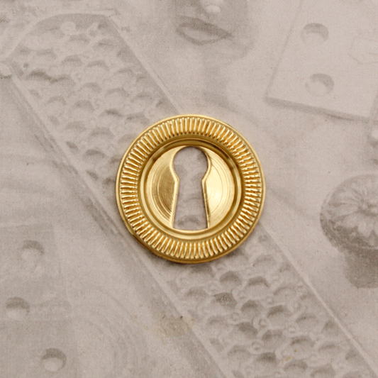 ROUND REEDED BRASS KEYHOLE