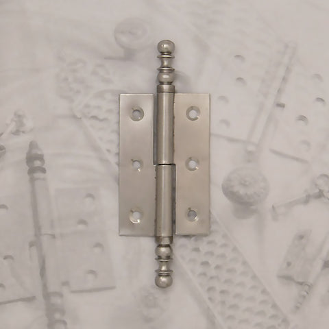 Decorative hardware hinge with finials