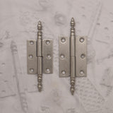 Decorative hardware hinge with finial