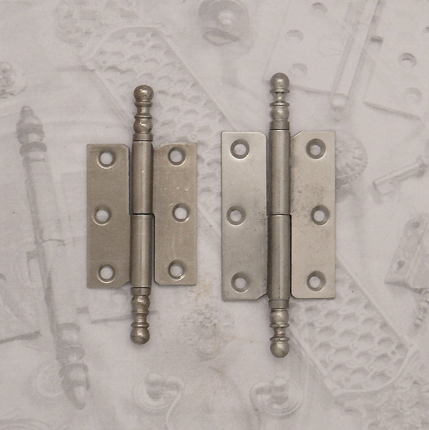 Decorative hardware hinge with finials