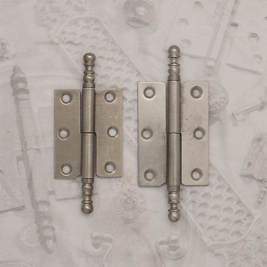 Decorative hardware hinge with finials