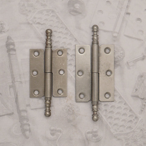Decorative hardware hinge with finials