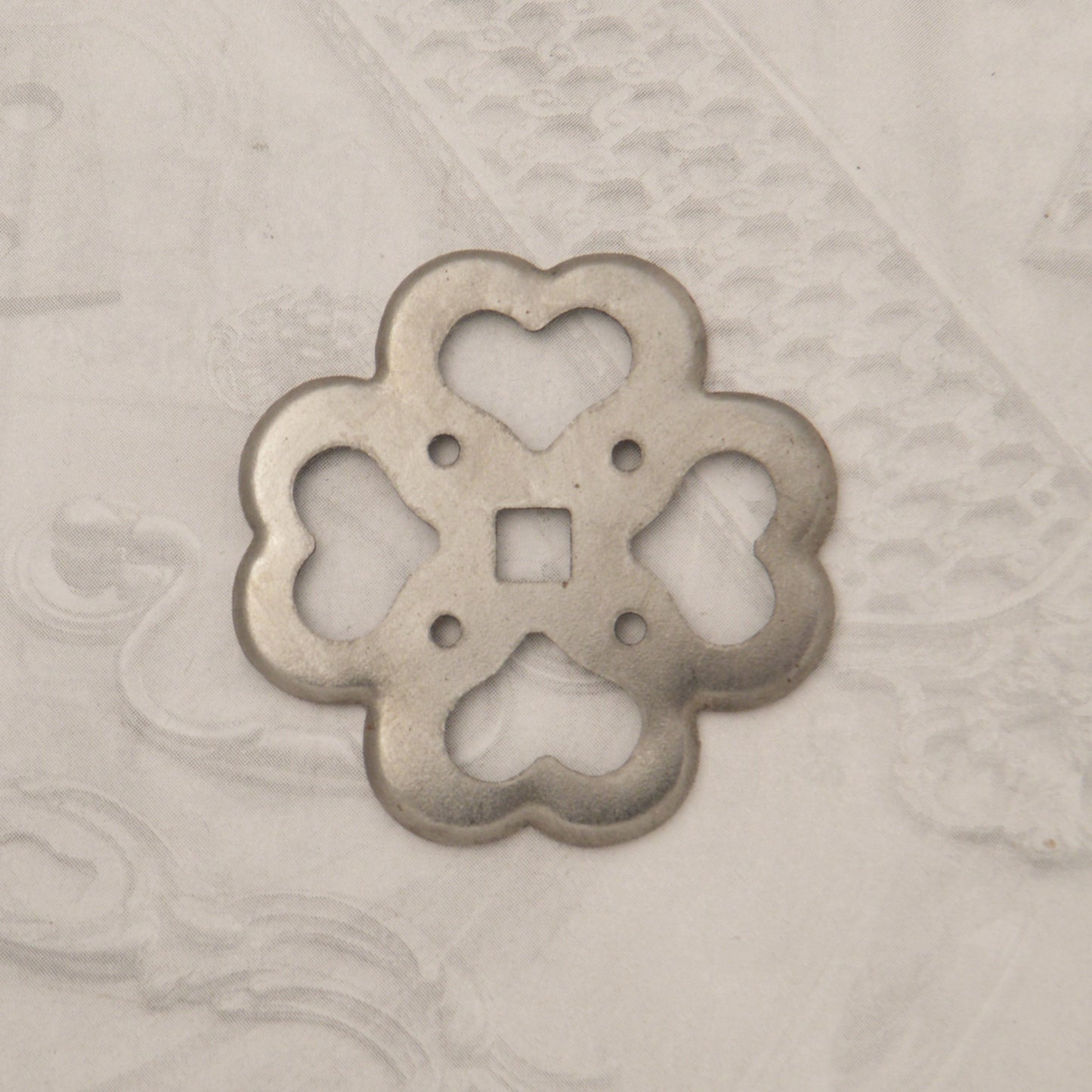 12.2704.51 IRON ROSETTE